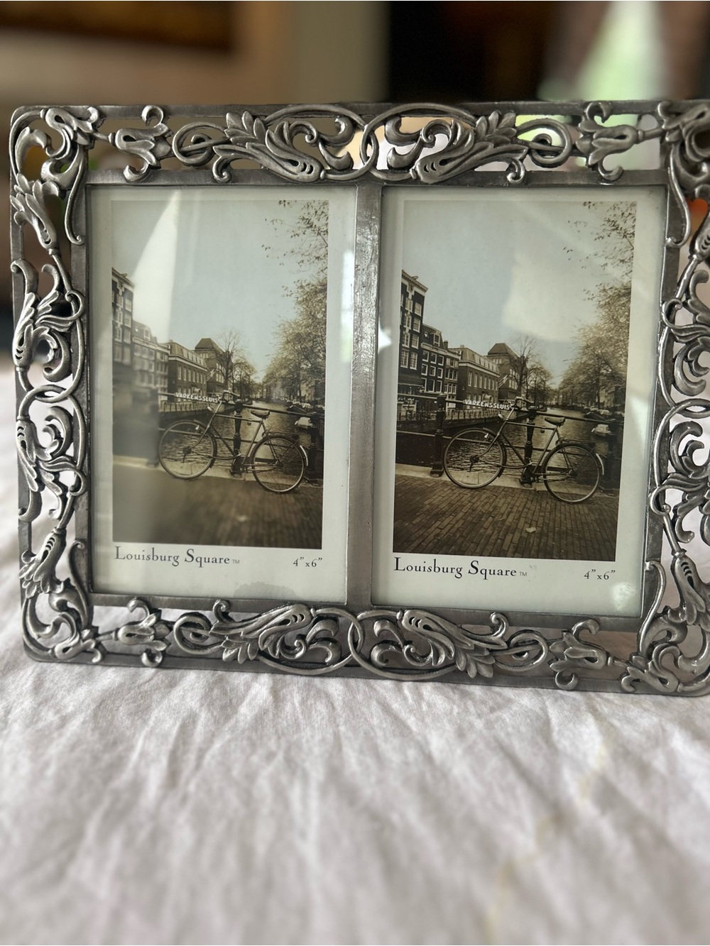 Ornate Double Photo Frame in Silver Finish, holds 2/5X7 pictures.